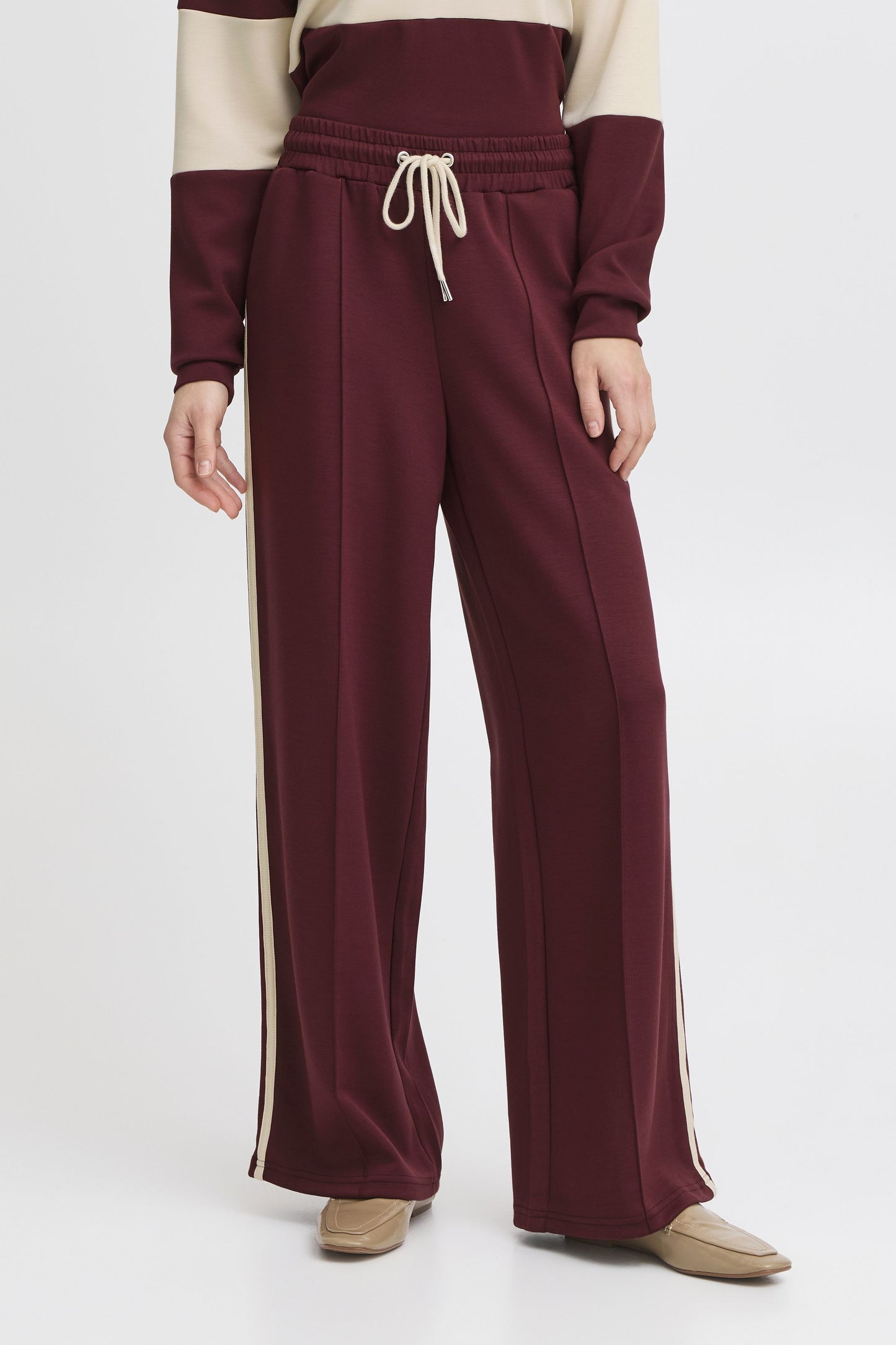 Trousers in Burgundy by b.young