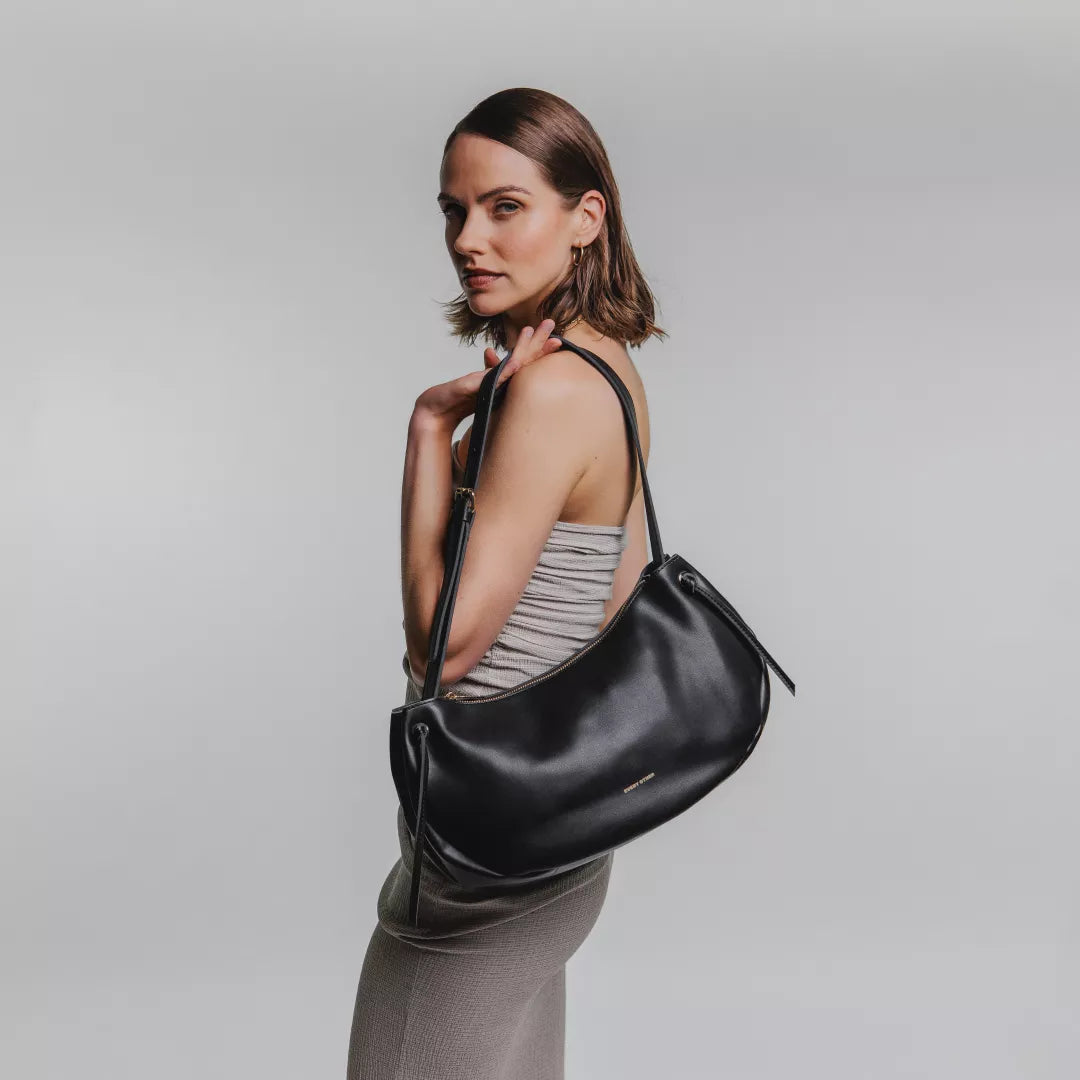 Tassel Slouch Shoulder Bag in Black by Every Other