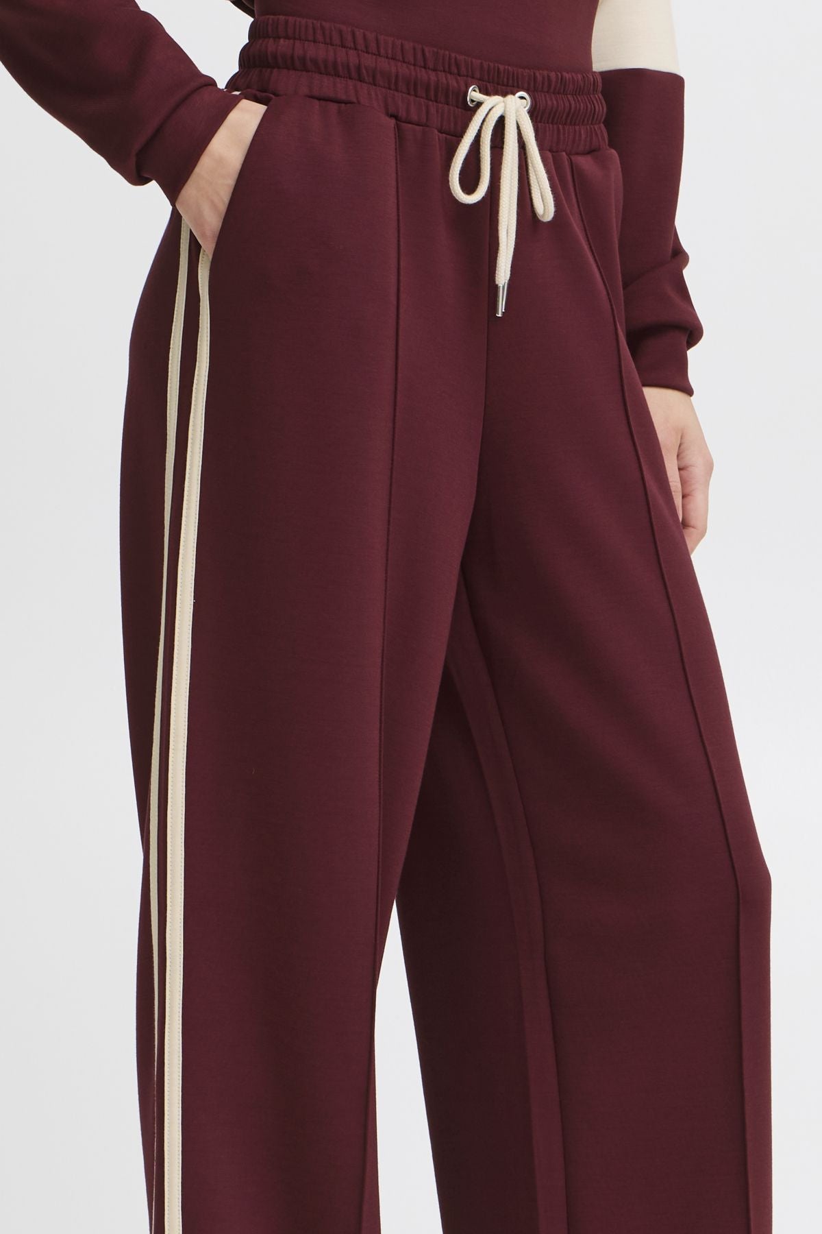 Trousers in Burgundy by b.young